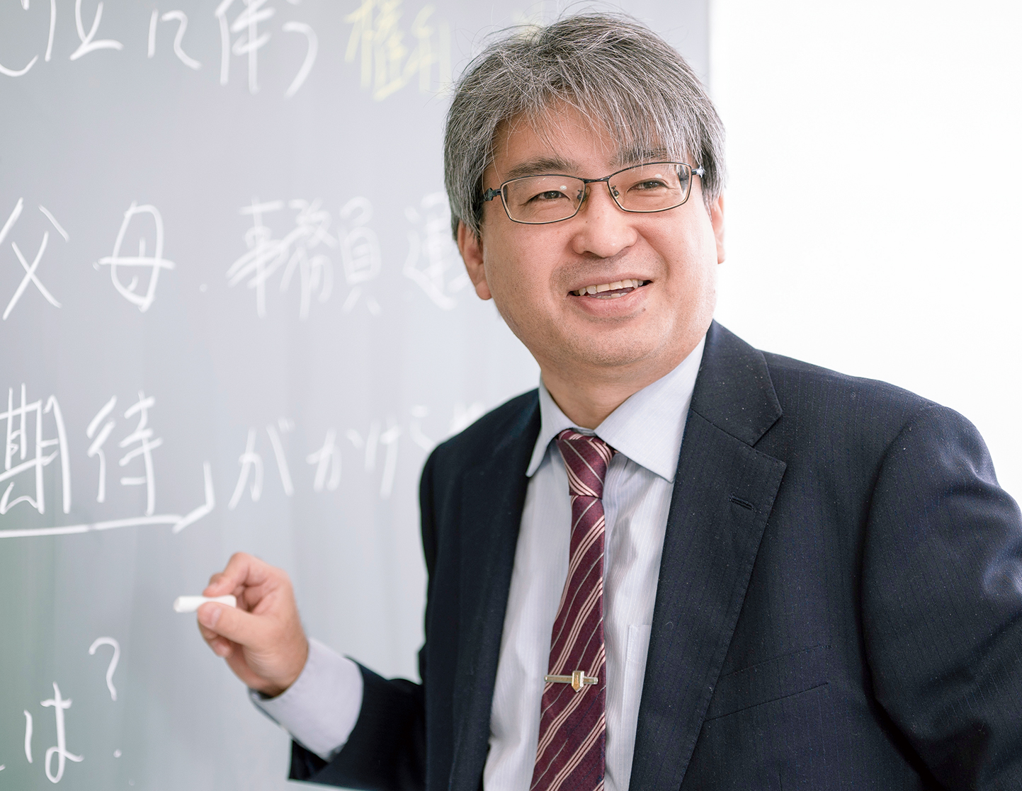 上田　耕介
